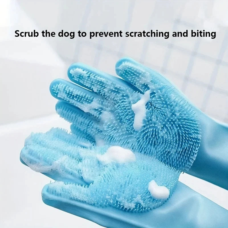 Blue grooming gloves with textured surface and soap suds on a white background